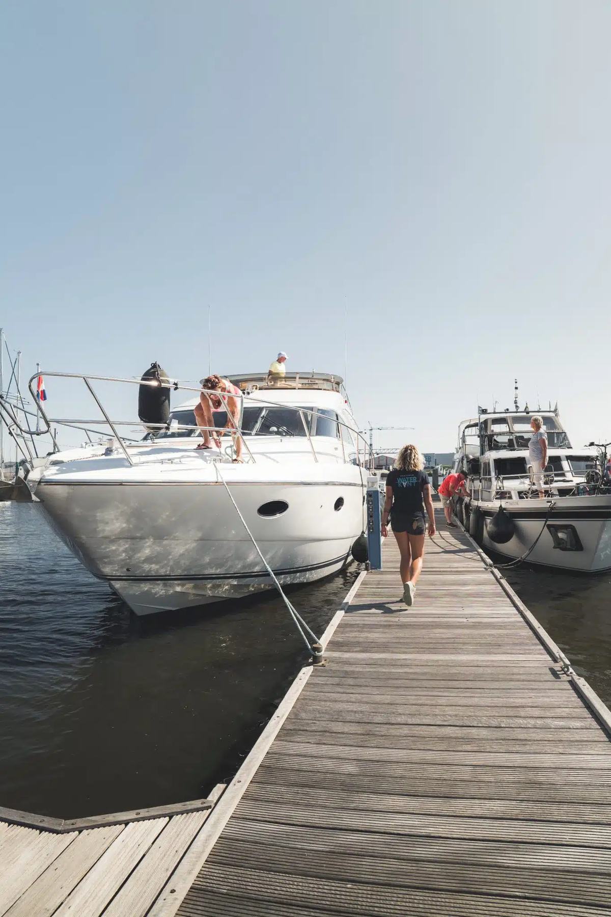De havenmeester op de steiger